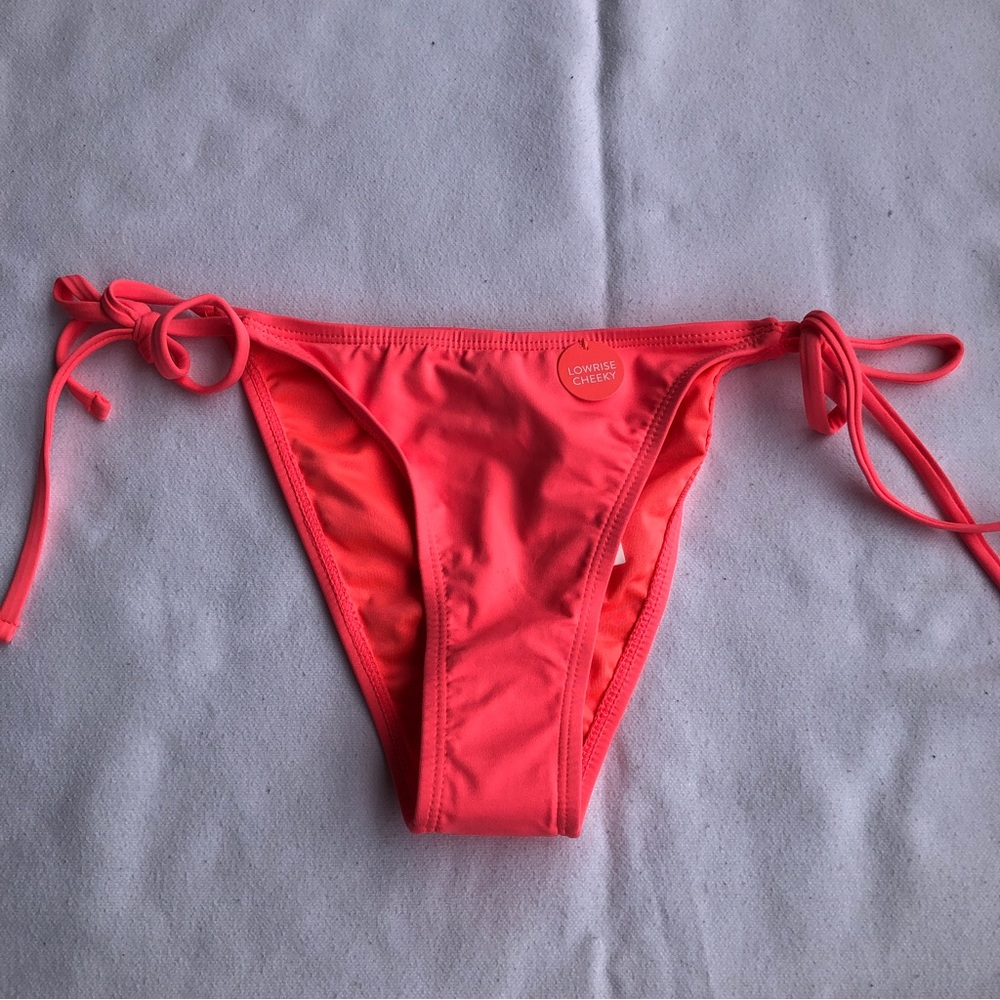 Forever 21 Bikini bottom it’s a bright pink low rise cheeky large